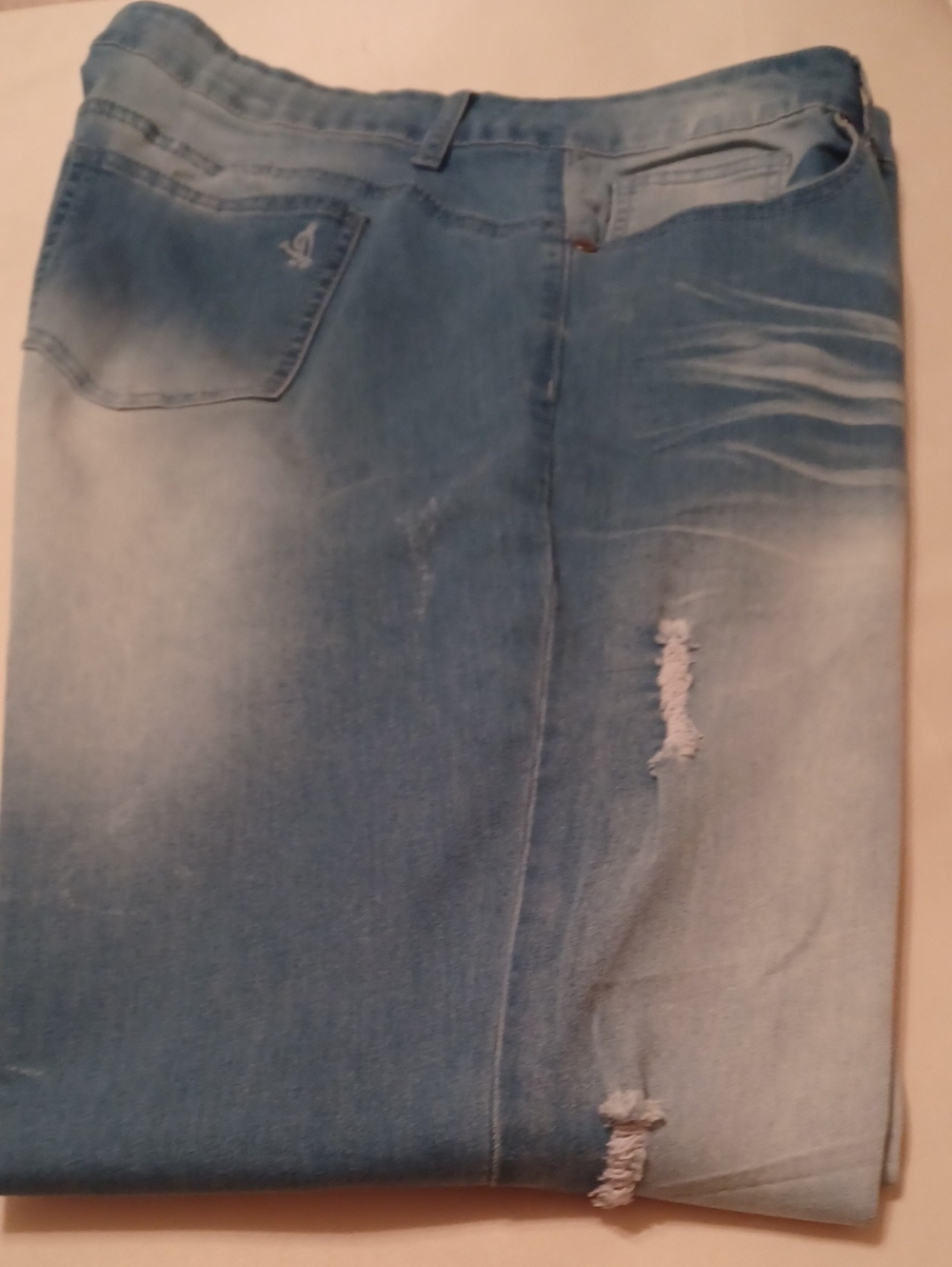 VIP Light Blue Skinny Jeans with Distressed Knees